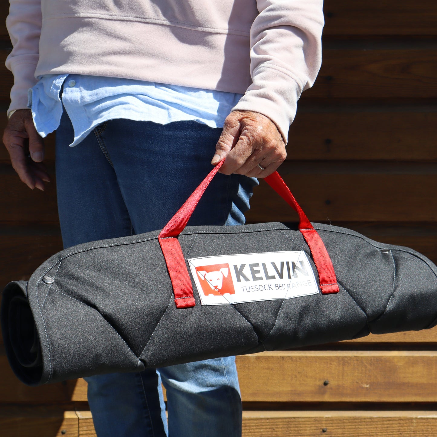 Carry the tussock dog mat on the go, premium NZ wool filled mat with carry handle